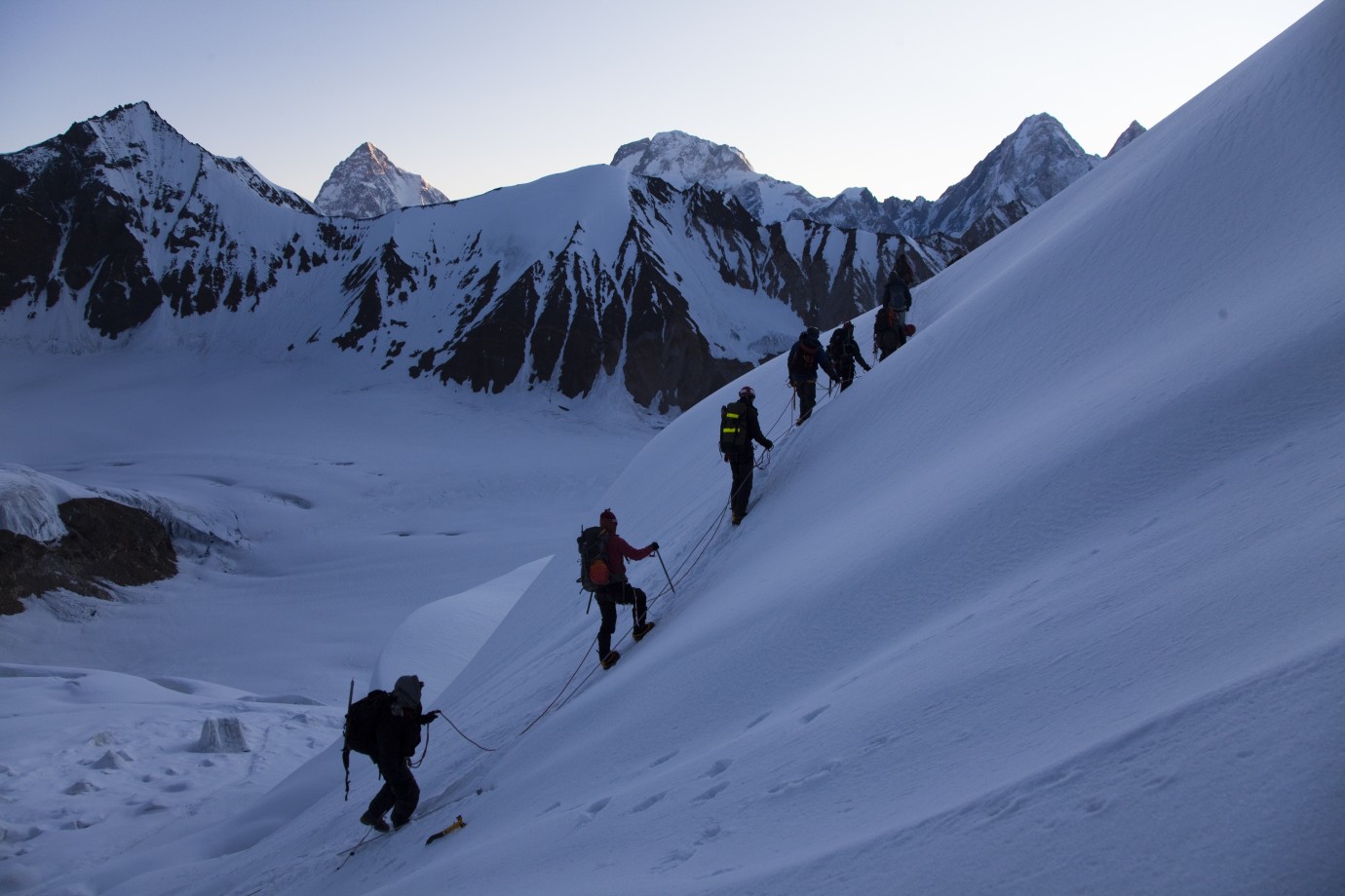 A panoramic view of the towering peaks and glaciers along the Baltoro Glacier, including K2, Broad Peak, and Gasherbrums, during the Machulo La Trek expedition.
