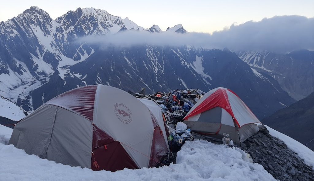 Noshaq peak, highest peak in Hindu Kush, Noshaq Chitral, Noshaq mountain Pakistan, climbing Noshaq, trekking in Chitral, 7000m peaks in Pakistan, Hindu Kush adventure, Noshaq base camp, northern Pakistan peaks