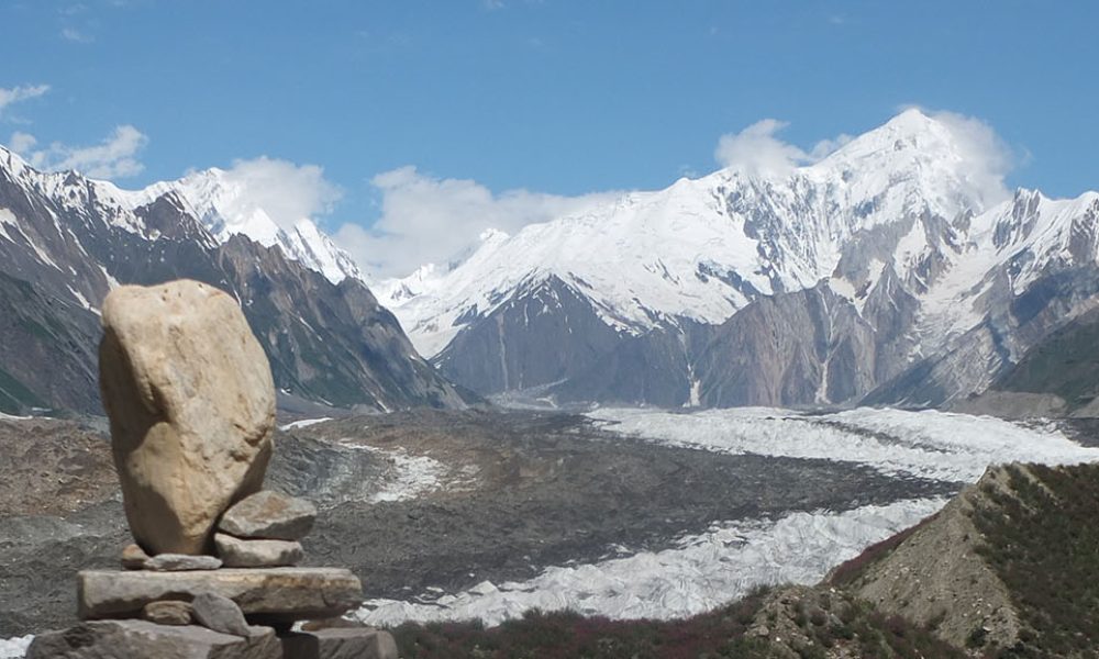 “Wakhi herders and yaks near Batura Glacier in Gojal Valley”