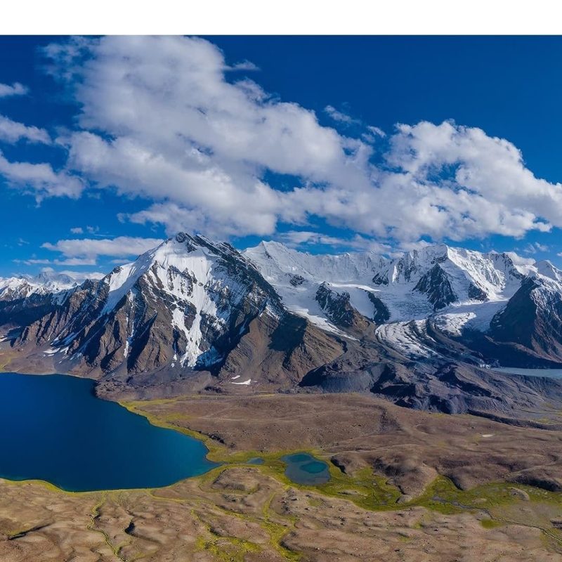 Beautiful lake at broghil chantar glacier in background