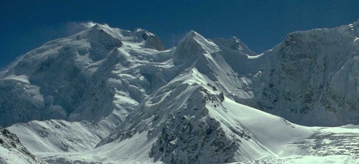 Hispar Peak, Hispar Valley, Gilgit-Baltistan, mountain expedition, high-altitude climbing, glacier terrain, snow-capped mountains, adventure tourism, rugged landscape, northern Pakistan, mountaineering, alpine scenery, exploration, outdoor adventure