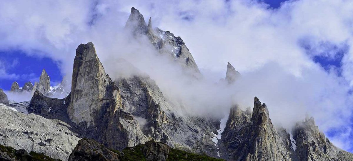 Scenic view of Kondus Valley with towering peaks and climbing routes.
