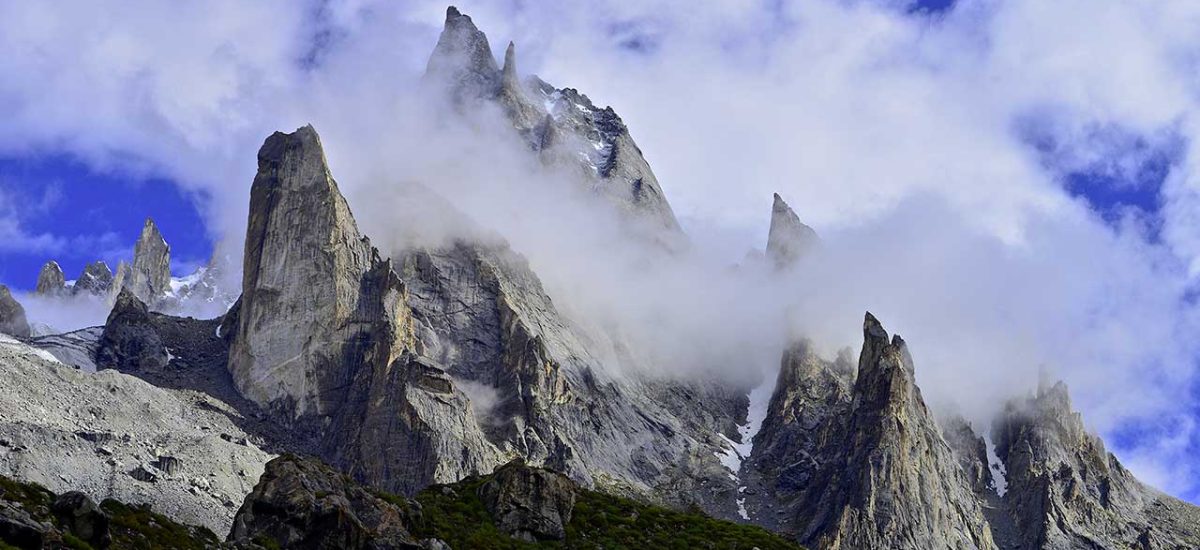 Scenic view of Kondus Valley with towering peaks and climbing routes.