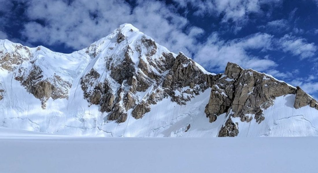 Sherpi Kangri (7,380 m) towering above the Kondus and Siachen glaciers in the Karakoram”