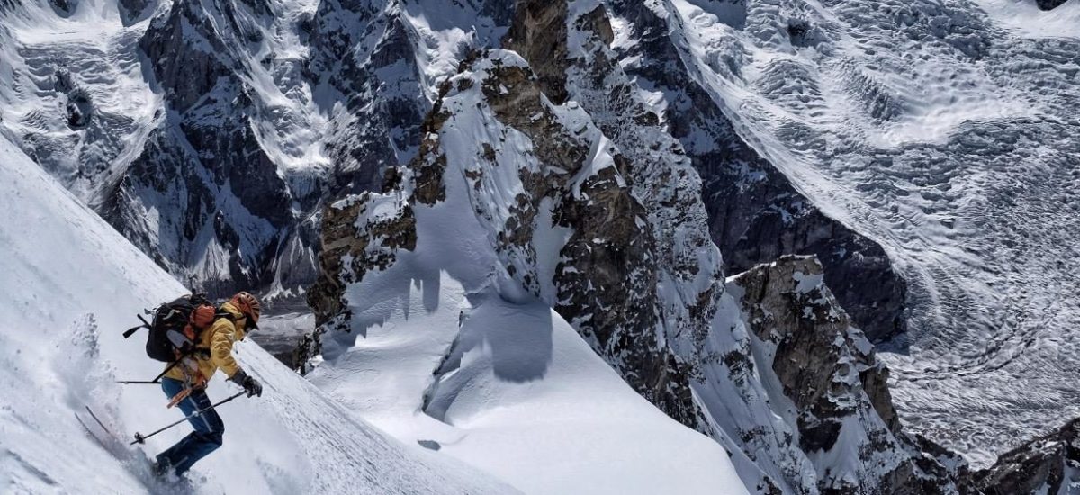Hispar Peak, Hispar Valley, Gilgit-Baltistan, mountain expedition, high-altitude climbing, glacier terrain, snow-capped mountains, adventure tourism, rugged landscape, northern Pakistan, mountaineering, alpine scenery, exploration, outdoor adventure