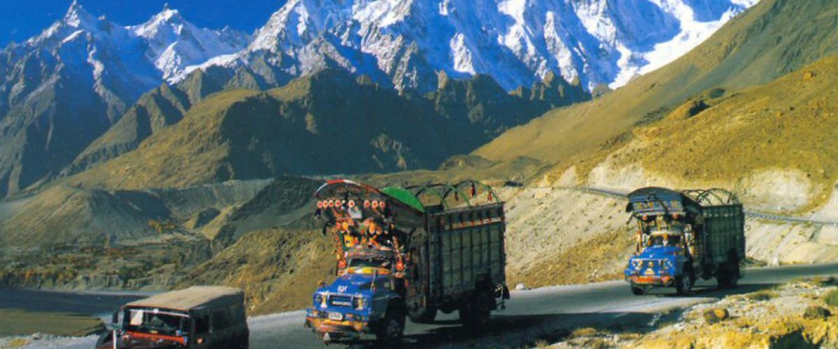 Ghandoghoro Peak, Hushe Valley, Gilgit-Baltistan, mountain expedition, trekking, alpine landscape, snow-capped peaks, adventure, Himalayas, northern Pakistan, mountaineering, scenic view, rugged terrain, outdoor adventure, traditional village